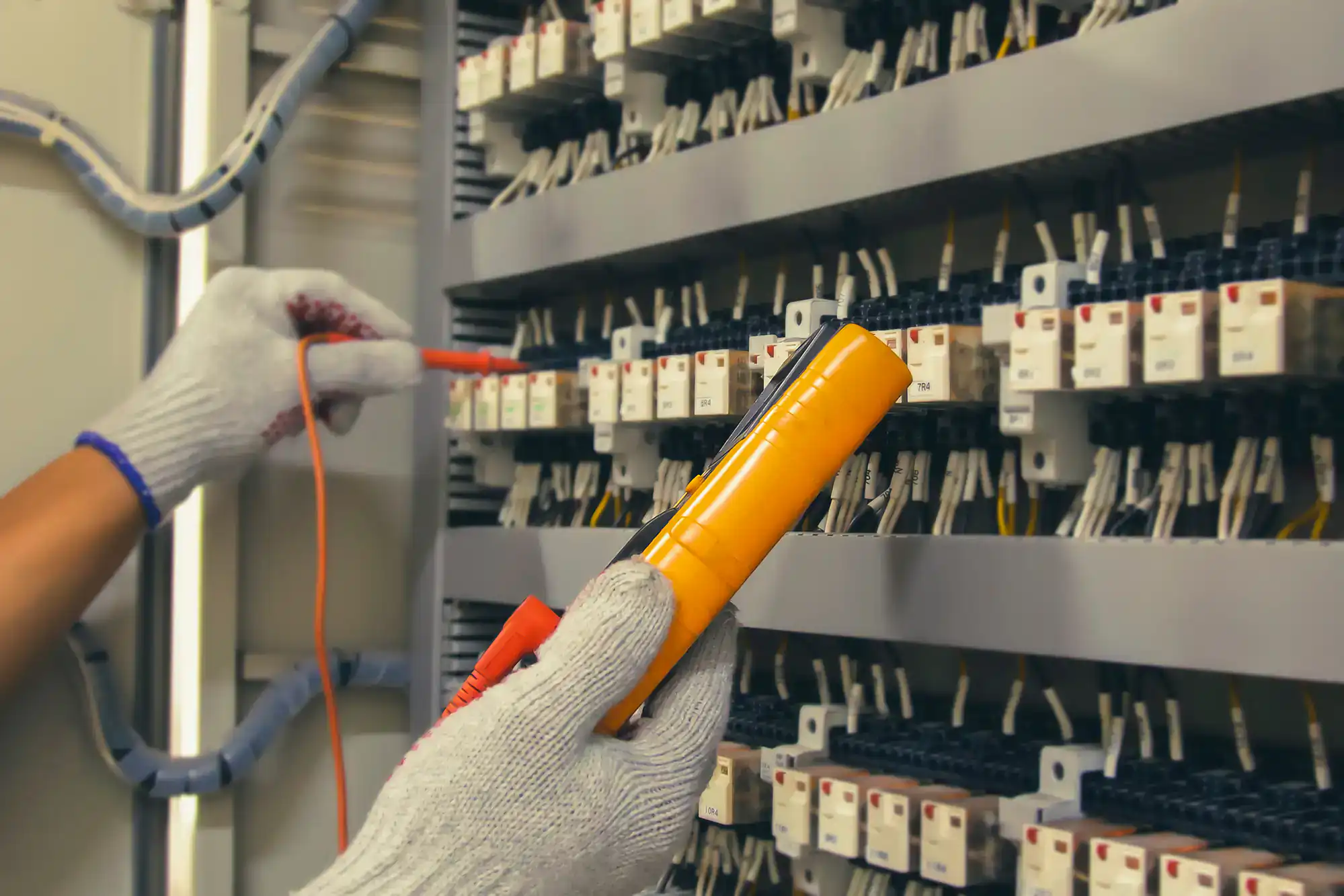 Technician repairing a residential electric panel in Dallas County, Texas, ensuring safe and reliable power distribution